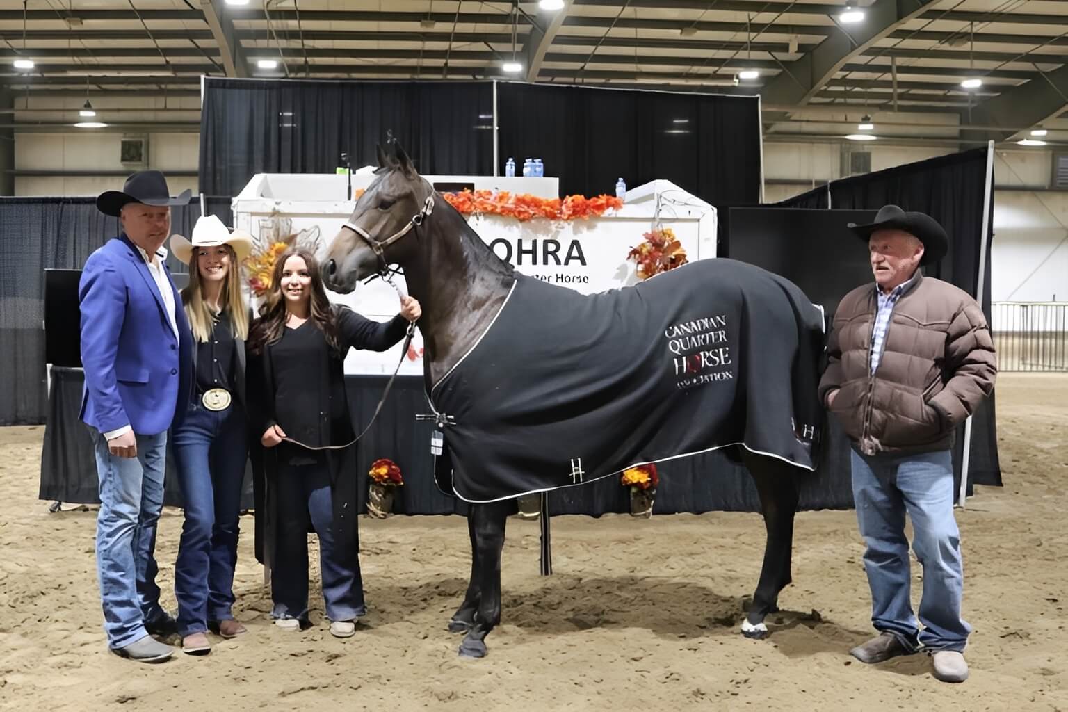 Celebrating horse show victory indoors